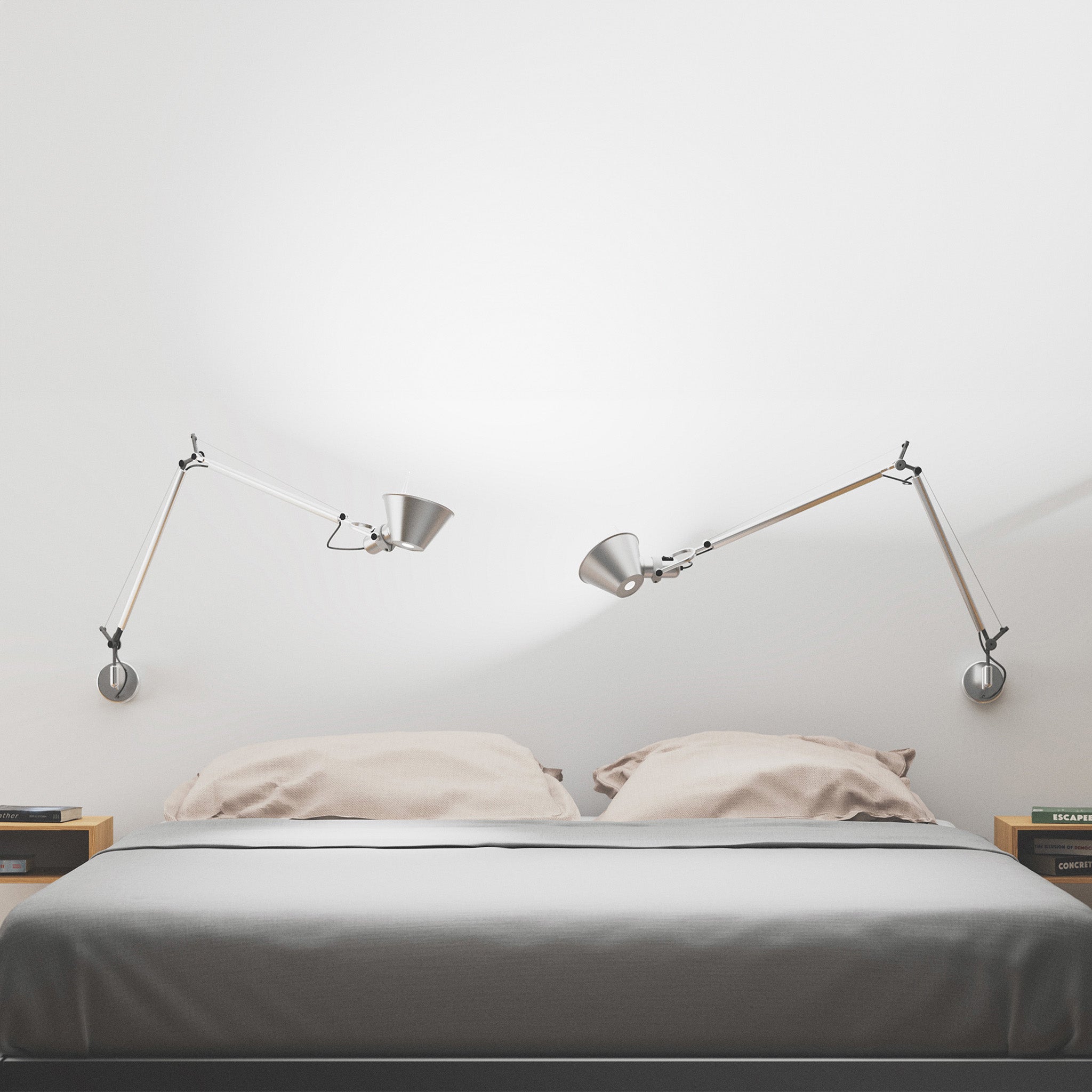 A modern bedroom featuring two Tolomeo lamps angled upwards, emitting vivid 4000K wide spectrum light with 98 CRI to simulate the morning sun and create an ideal waking environment.